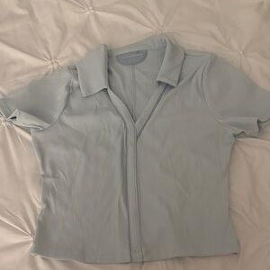 Travis Matthew golf shirt light blue